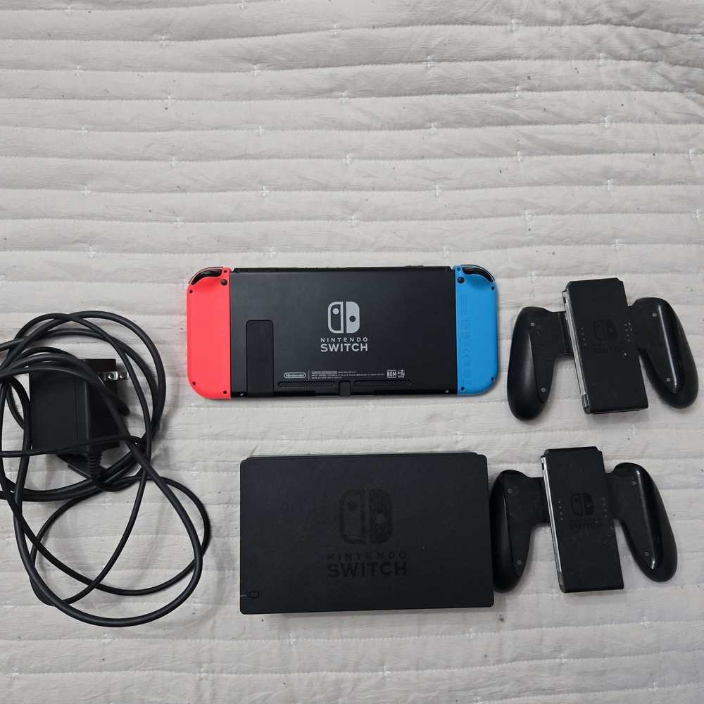 Nintendo Switch Console with Red and Blue Joy-Con